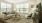 a living room with several windows