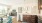 a kitchen with wood cabinets