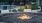 a fire pit with a flame